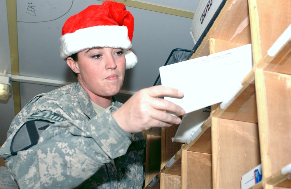 Mail Clerks Act As Santa's Little Helpers During Holidays