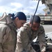 Sailors Conduct Maintenance Check