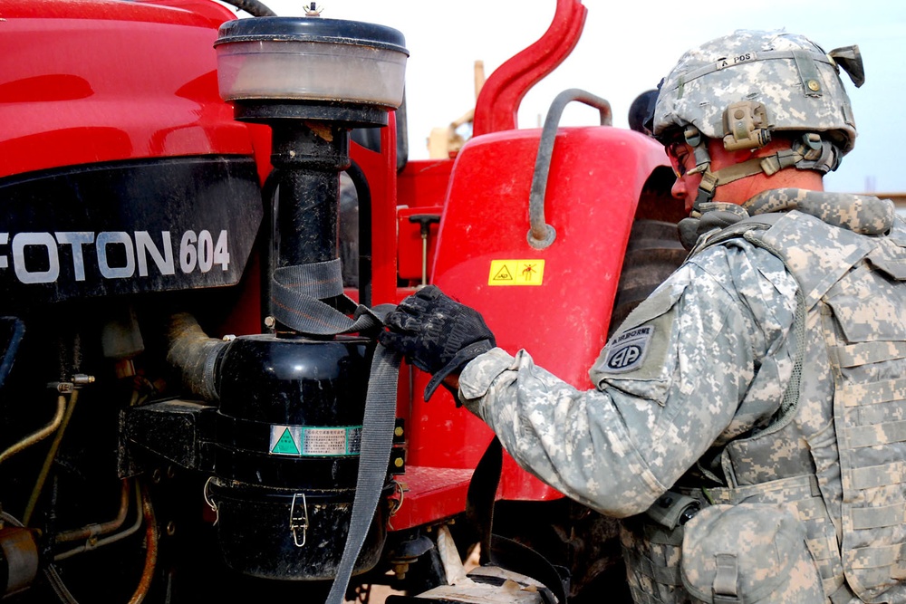 Task Force Marne Soldiers present Iraqi farmers with equipment