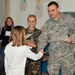 Proud California Guardsmen watch their English Club students graduate in Kosovo