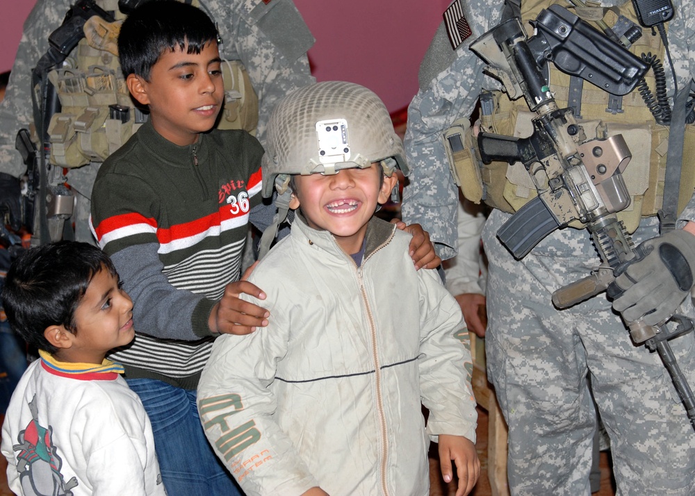 Iraq ERB, U.S. forces donate to Tikrit orphanage