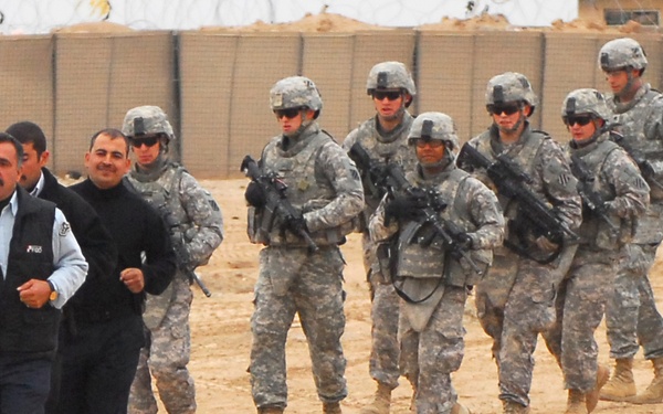 Men bond over weapons