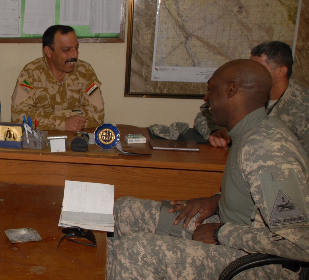 1/1 Armored Division Command Sgt. Major Meets 12th Iraqi Army Command Sgt. Major