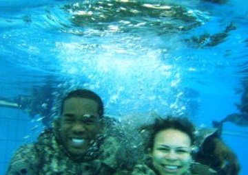 Paratroopers Jump Into Water Survival Training