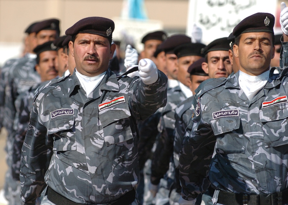 Iraqi police demonstrate their advanced capabilities to Prime Minister Maliki on Iraq's national police day