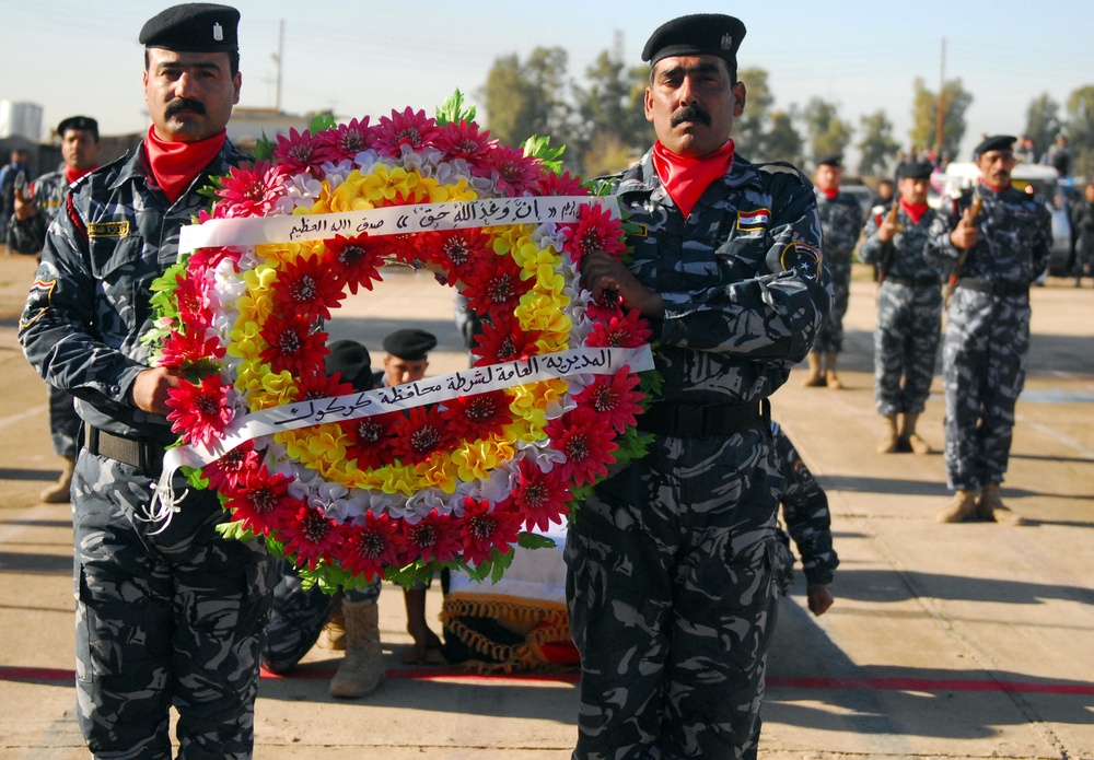 Iraqi police celebrate 88th birthday