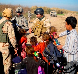 Joint Humanitarian mission spreads joy and warmth to 100 Iraqi families