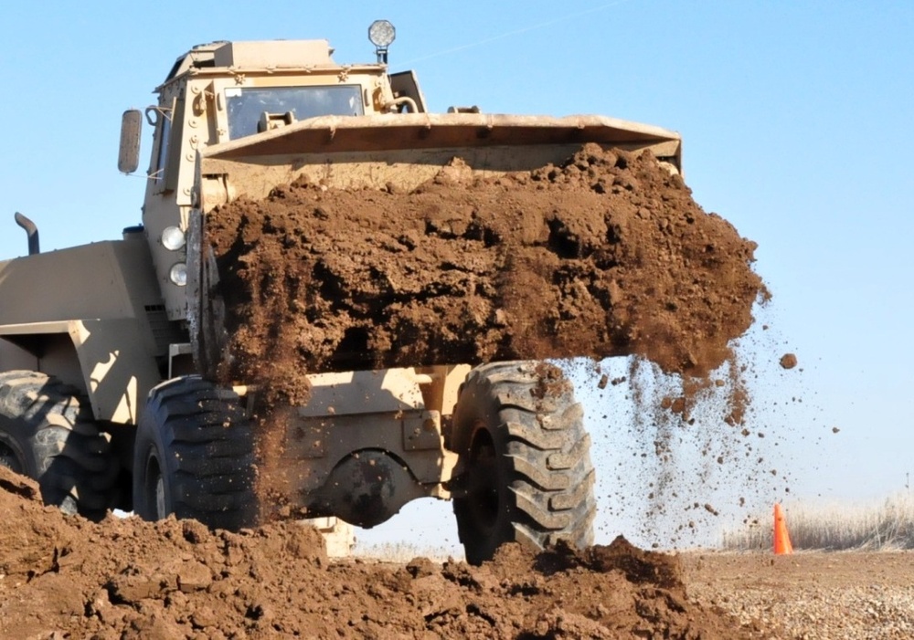 Soldiers build new road to detention facility at Taji