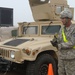 317th Engineers work to keep parking lot mud free