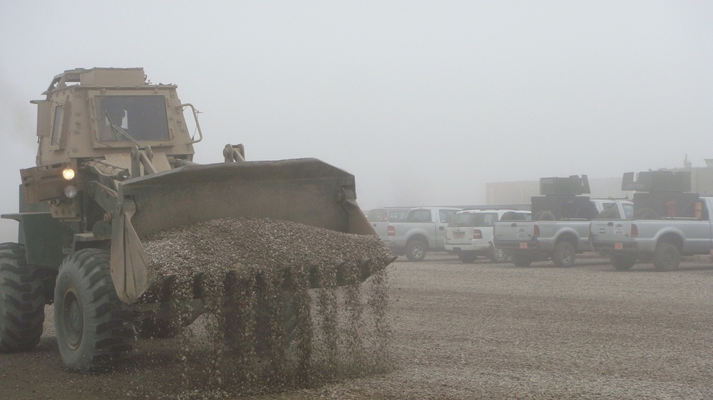 317th Engineers work to keep parking lot mud free