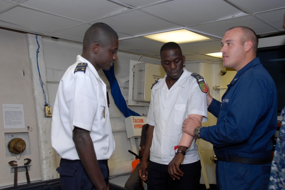 Congolese Navy Members Learn Combat Life Saver Training