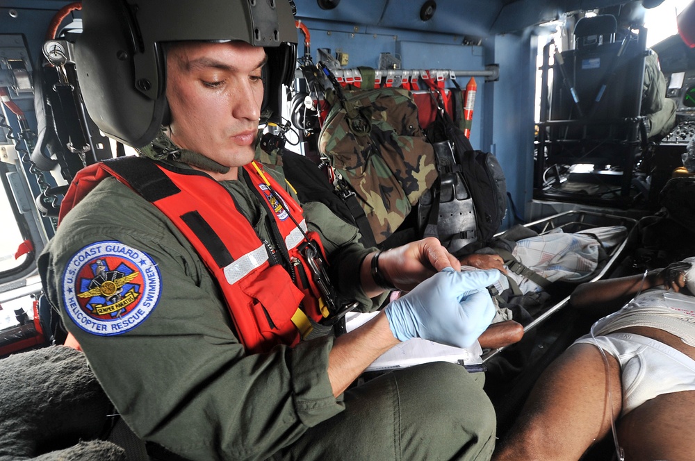 Coast Guard Aircrews Medevac Injured Haitians