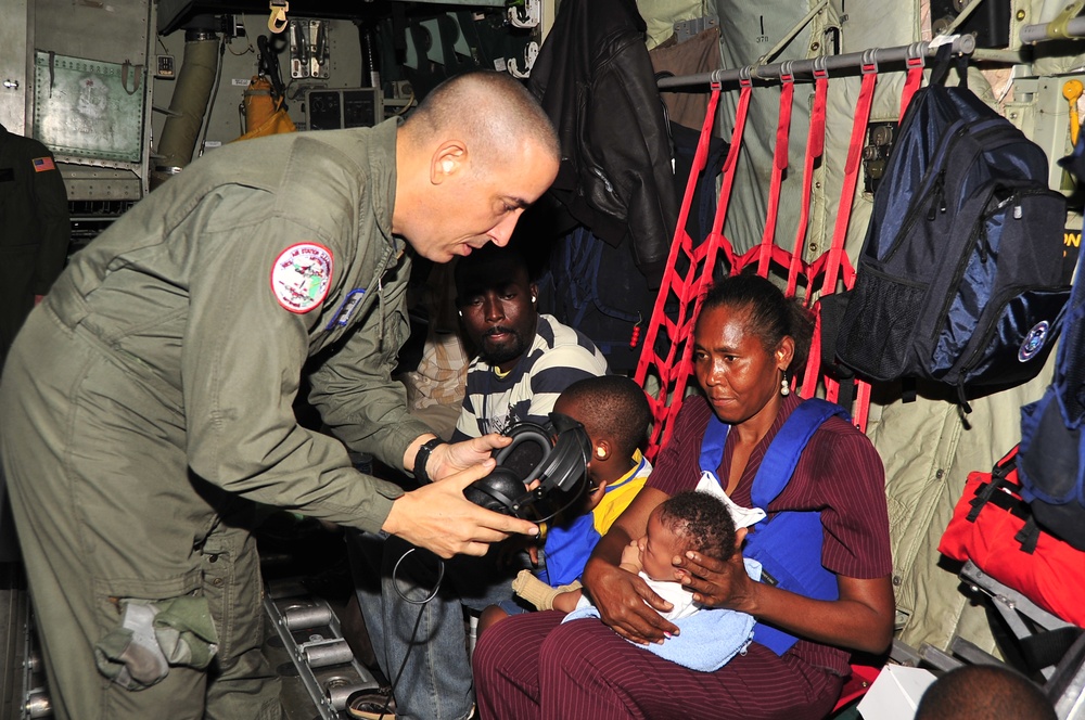 Coast Guard C-130 Evacuates U.S. Citizens From Haiti