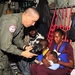 Coast Guard C-130 Evacuates U.S. Citizens From Haiti