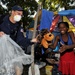 Coast Guard Member Distributes Stuffed Animal