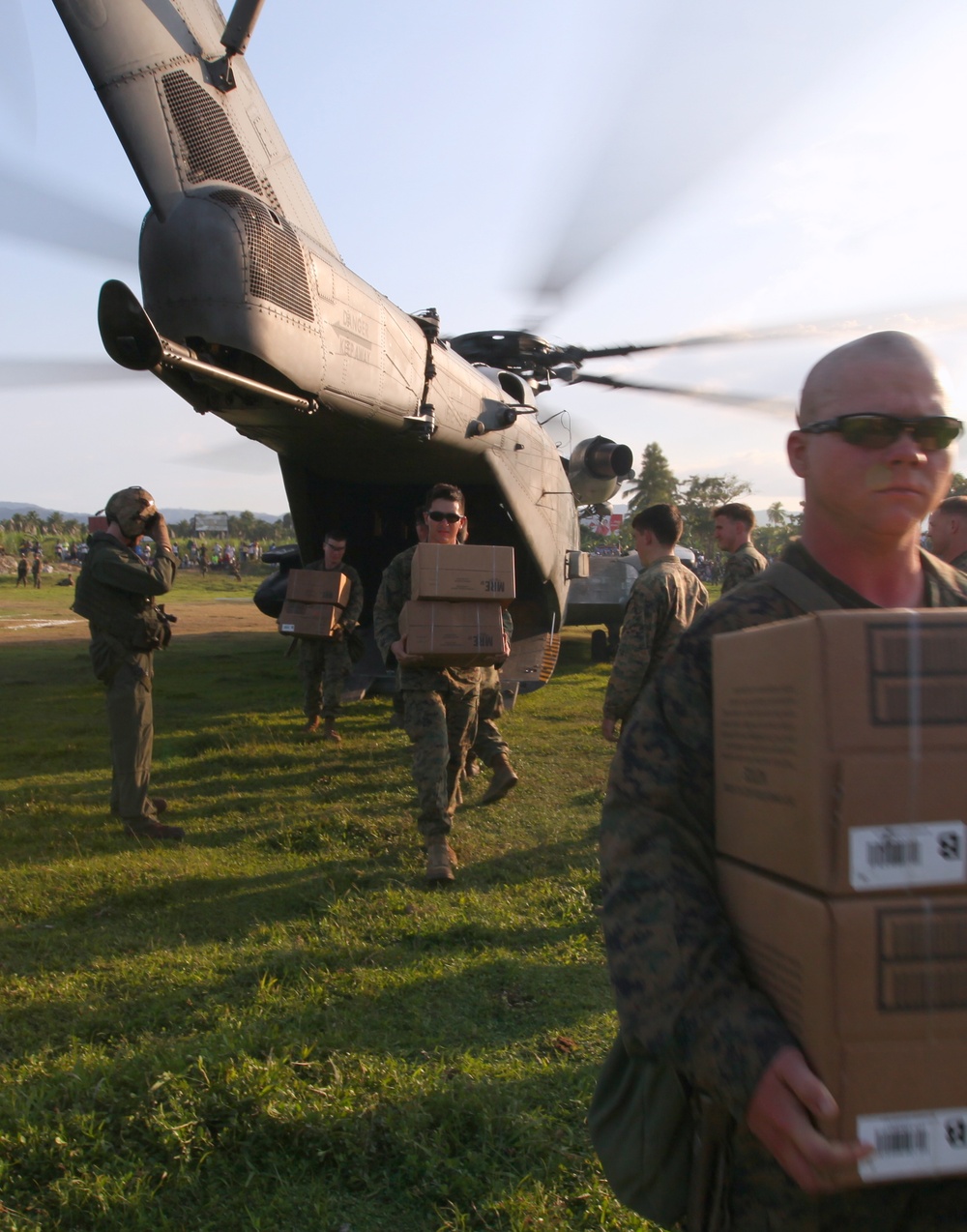 22nd MEU Marines unload supplies for Haiti Relief efforts