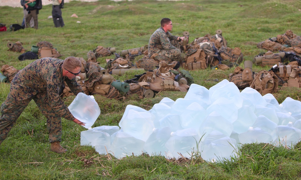 22nd MEU Marines unload supplies for Haiti Relief efforts