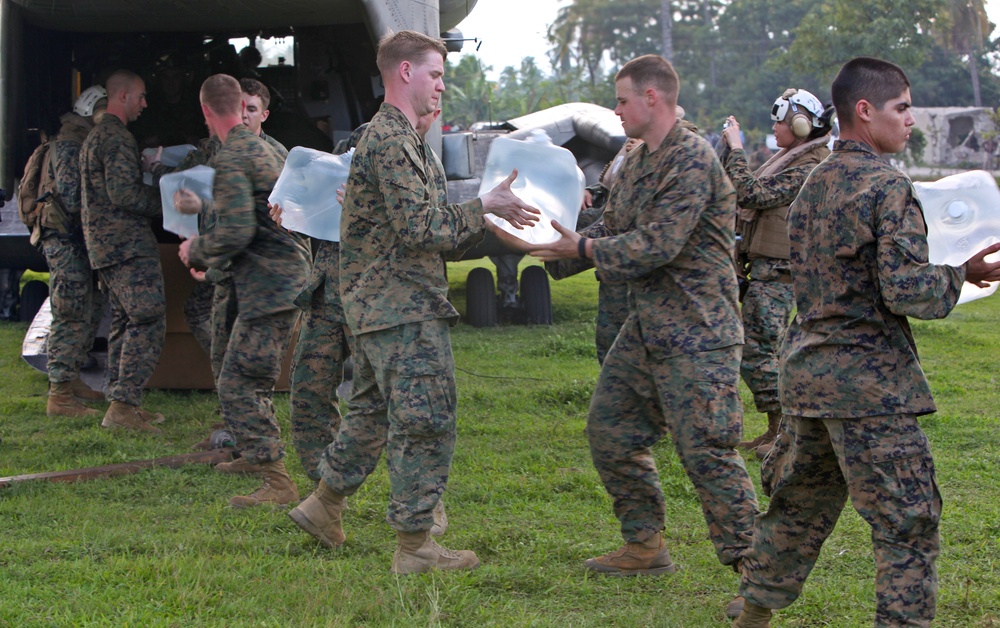 22nd MEU Marines unload supplies for Haiti Relief efforts