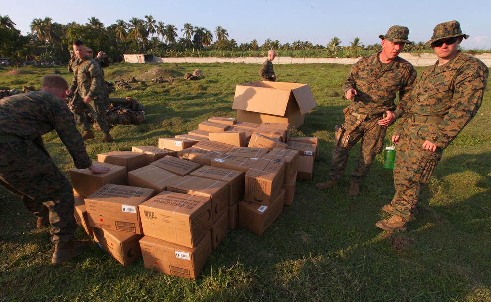 22nd MEU Marines unload supplies for Haiti Relief efforts
