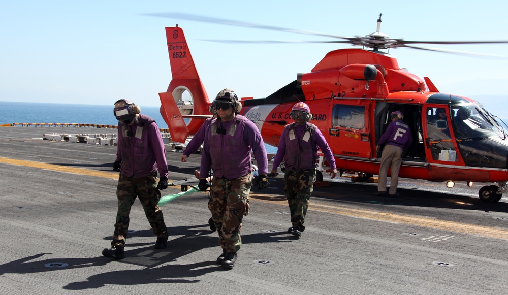 U.S. Coast Guard Helicopter to Deliver Haitian Earthquake Victims