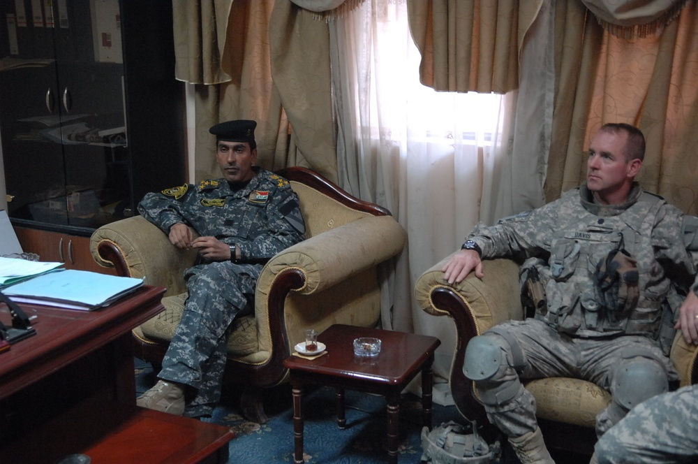 Family members of fallen Iraqi security forces members paid at Iraqi court house