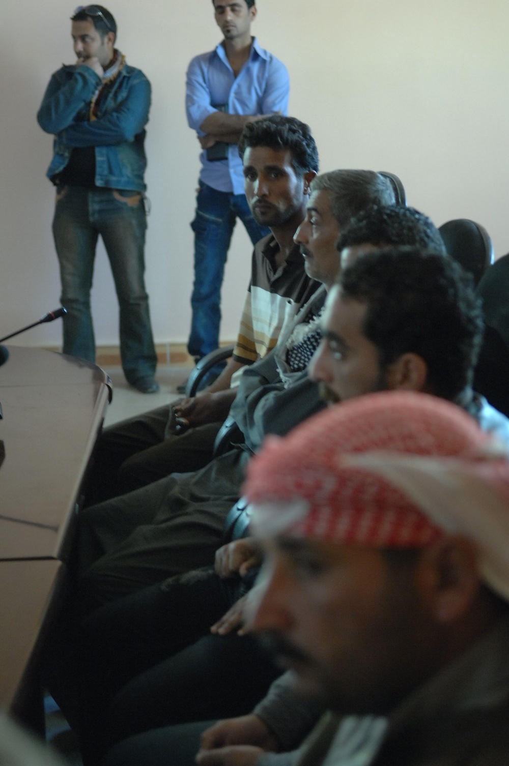 Family members of fallen Iraqi security forces members paid at Iraqi court house