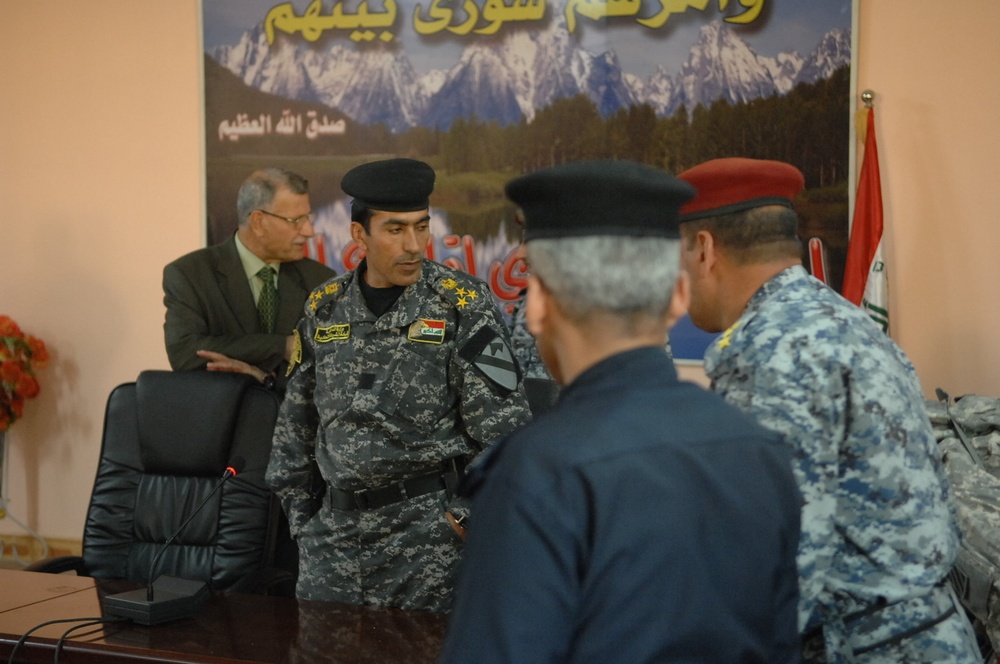 Family members of fallen Iraqi security forces members paid at Iraqi court house