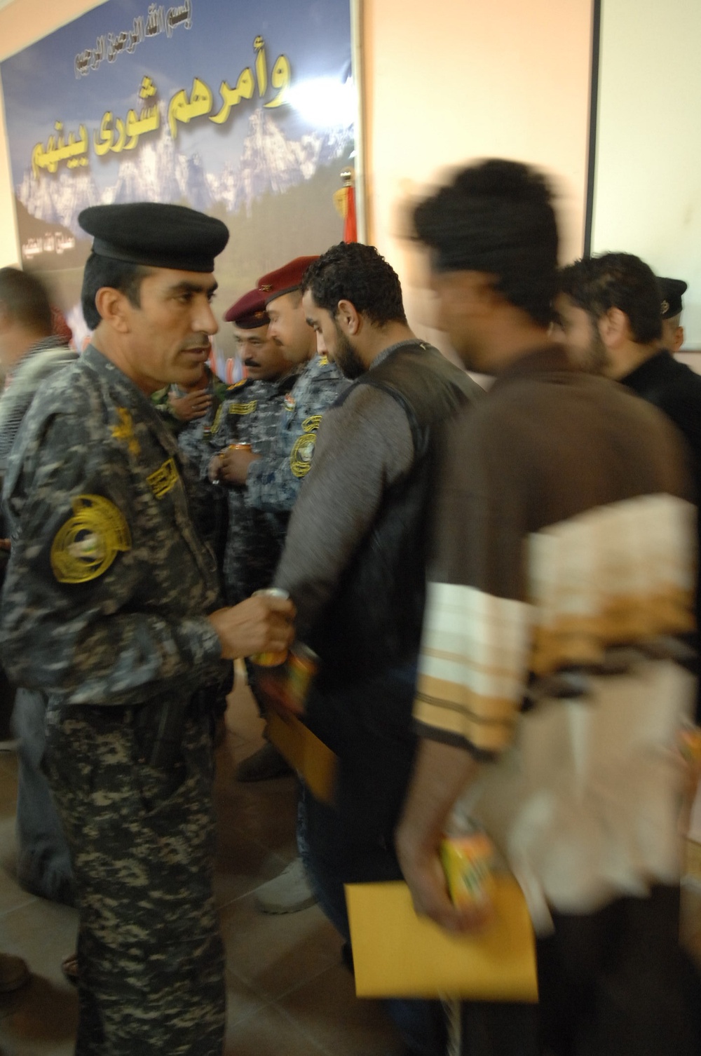 Family members of fallen Iraqi security forces members paid at Iraqi court house