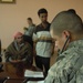 Family members of fallen Iraqi security forces members paid at Iraqi court house