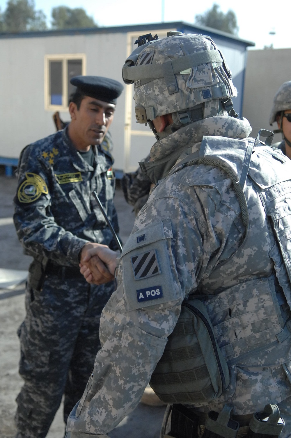 Family members of fallen Iraqi security forces members paid at Iraqi court house