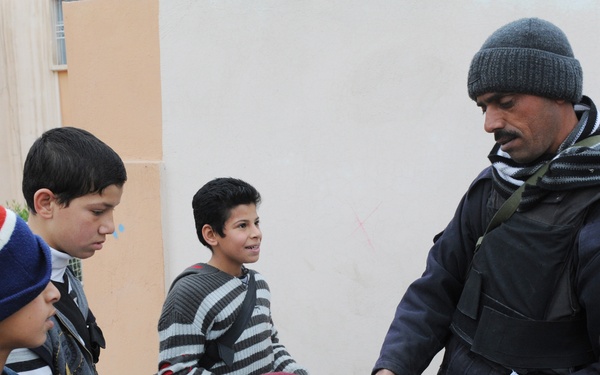 U.S. Soldiers and ESU Meet With Local Nationals