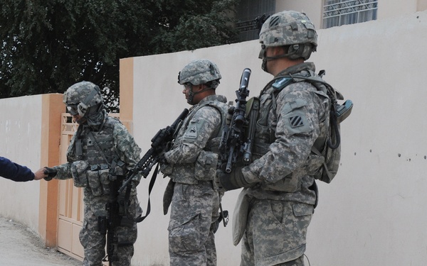 U.S. Soldiers and ESU Meet With Local Nationals