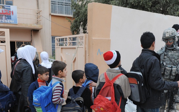 U.S. Soldiers and ESU Meet With Local Nationals