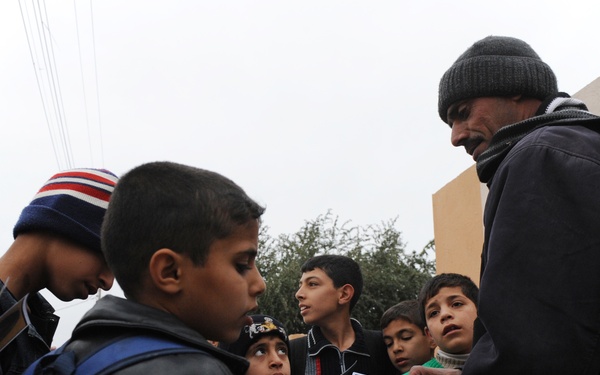 U.S. Soldiers and ESU Meet With Local Nationals