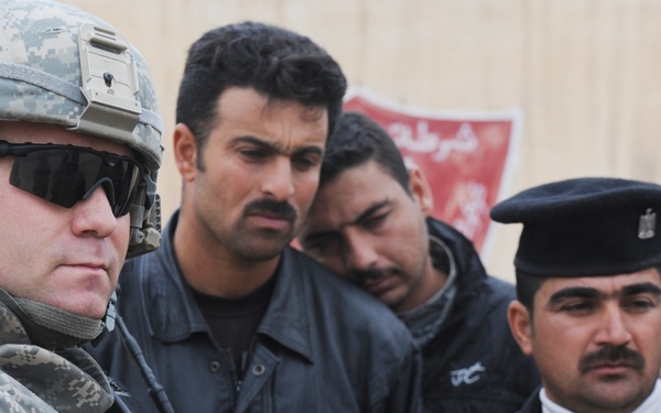 U.S. Soldiers and ESU Meet With Local Nationals