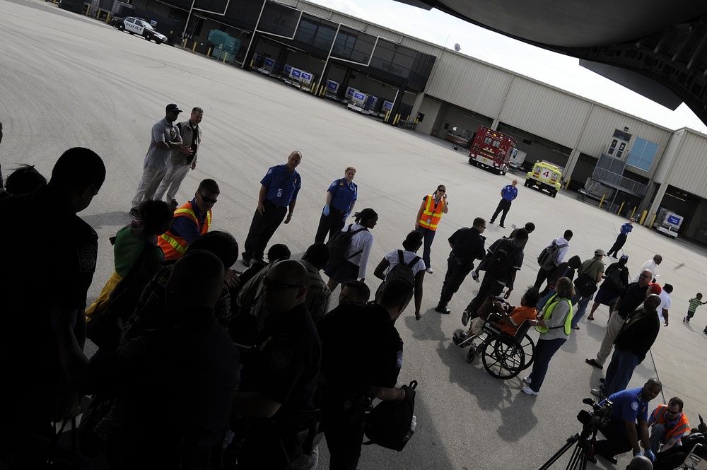 Earthquake evacuees arriving at Orlando-Sanford International Airport