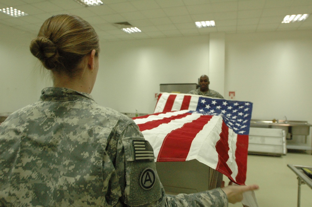 Soldiers prepare fallen heroes for final homecoming