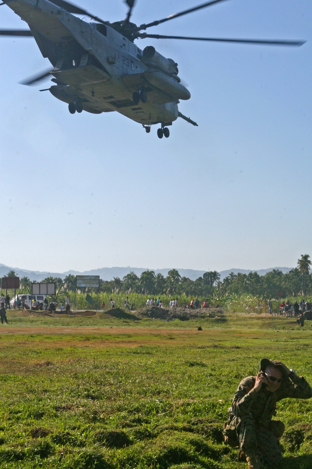 Marine Heavy Helicopter Squadron 461 (Reinforced) as it lifts off after it delivered food and water