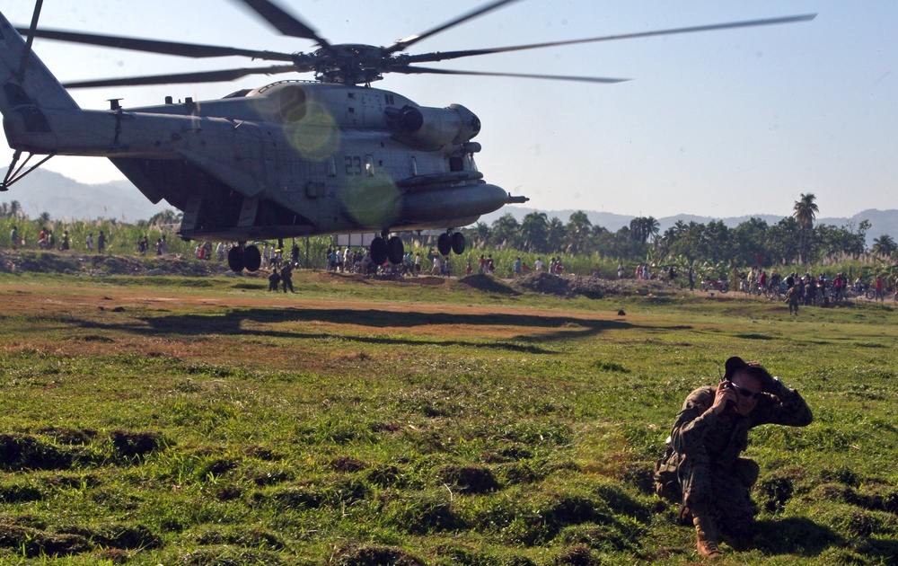 Marine Heavy Helicopter Squadron 461 (Reinforced) as it lifts off after it delivered food and water