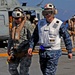 Sailors of USS Bataan stand-by as Lt. General Ken Keen, Joint Task Force Haiti commander, arrives