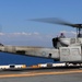 Sailors of USS Bataan stand-by as Lt. General Ken Keen, Joint Task Force Haiti commander, arrives