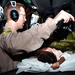 Air Force Team Cares for Haiti Victims in Flight