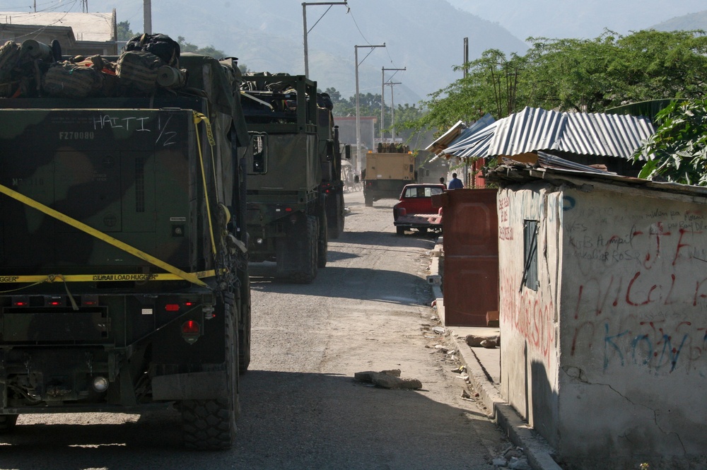 22nd Marine Expeditionary Unit, travels through Grand Goave en route to Petit Goave, Haiti, Jan. 24.