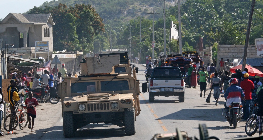 22nd Marine Expeditionary Unit, travels through Grand Goave en route to Petit Goave, Haiti, Jan. 24.