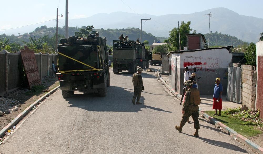 22nd Marine Expeditionary Unit, travels through Grand Goave en route to Petit Goave, Haiti, Jan. 24.