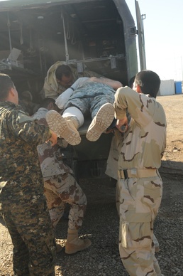 Iraqi Soldiers test skills in mass casualty exercise at Taji