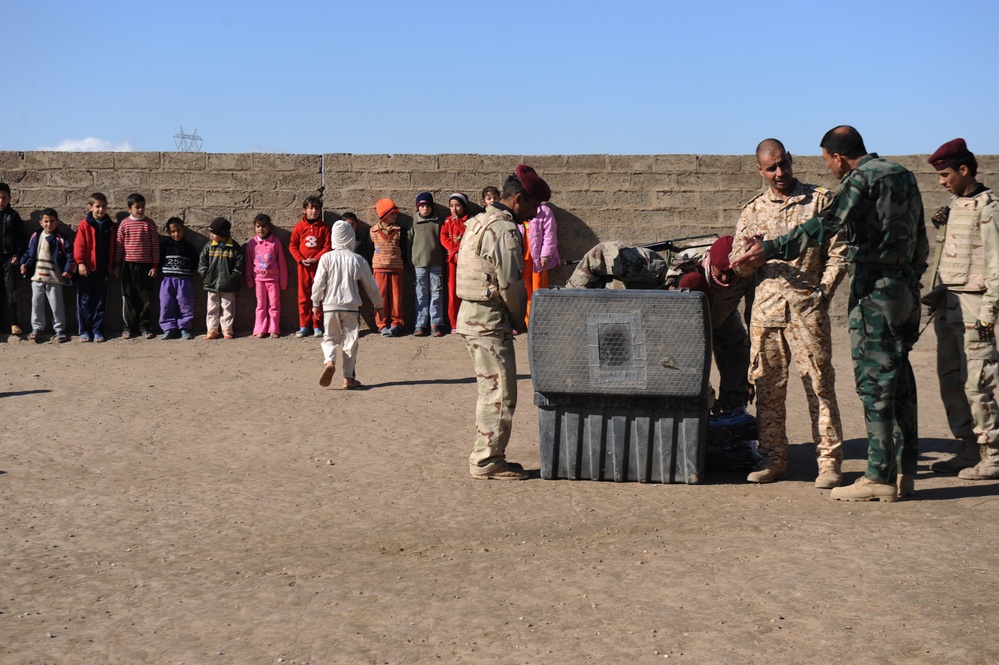 Iraqi Soldiers Deliver Backpacks To Kids