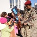Iraqi Soldiers Deliver Backpacks To Kids
