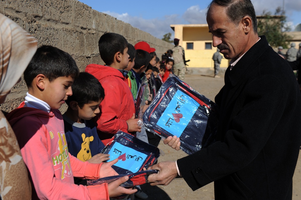 Iraqi Soldiers Deliver Backpacks To Kids