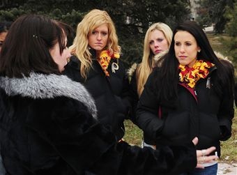 Redskins cheerleaders entertained by gifted musicians